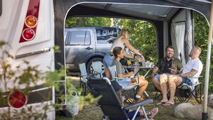 Family relaxing at camping site