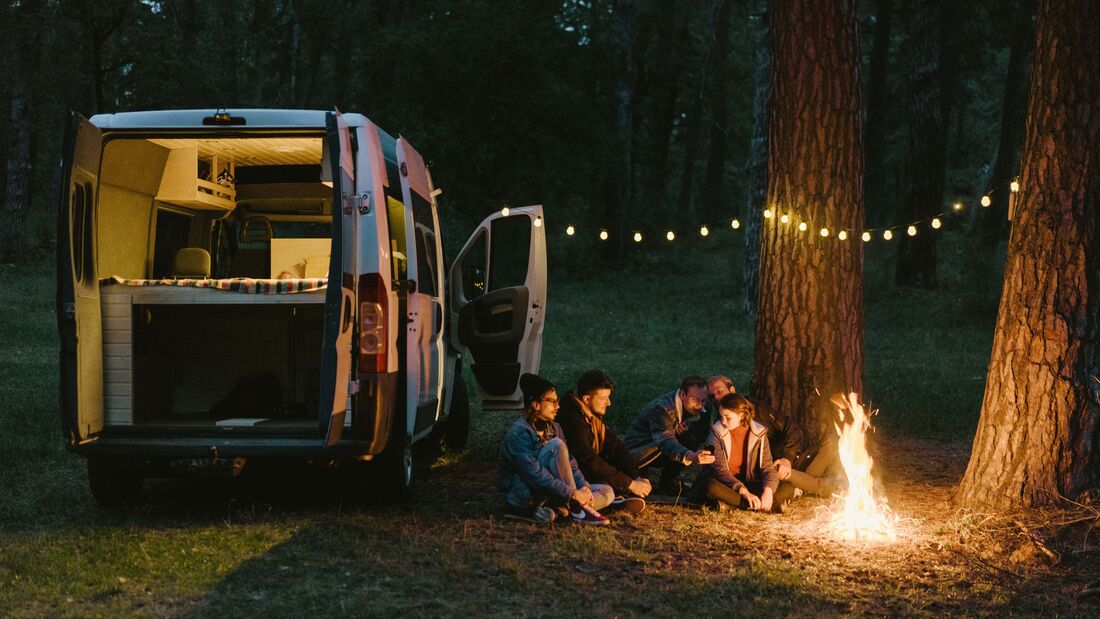 Friends camping near the forest